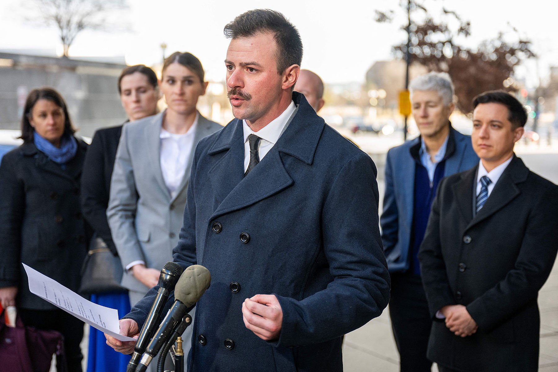 Army Reserve 2nd Lt. Nicolas Talbott speaks outside a Washington, D.C. courthouse.