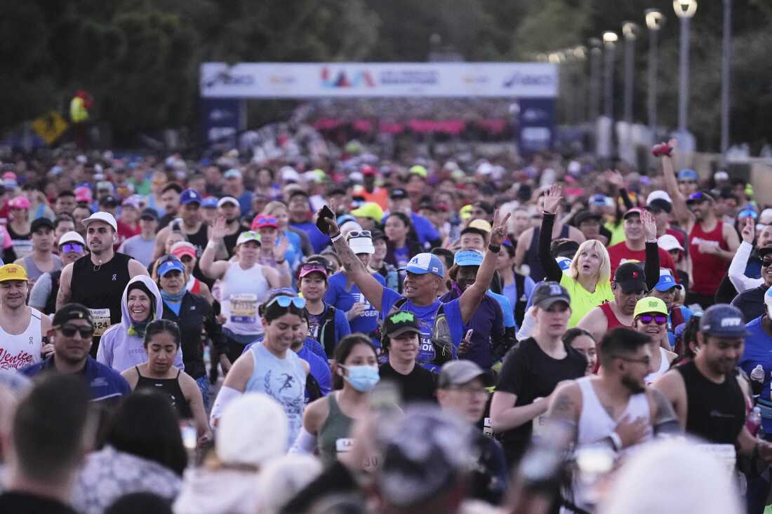 Participants prepare for the start of the Los Angeles Marathon Sunday, in Los Angeles.