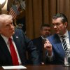 President Trump looks on as Defense Secretary Pete Hegseth speaks during a cabinet meeting at the White House on Wednesday.