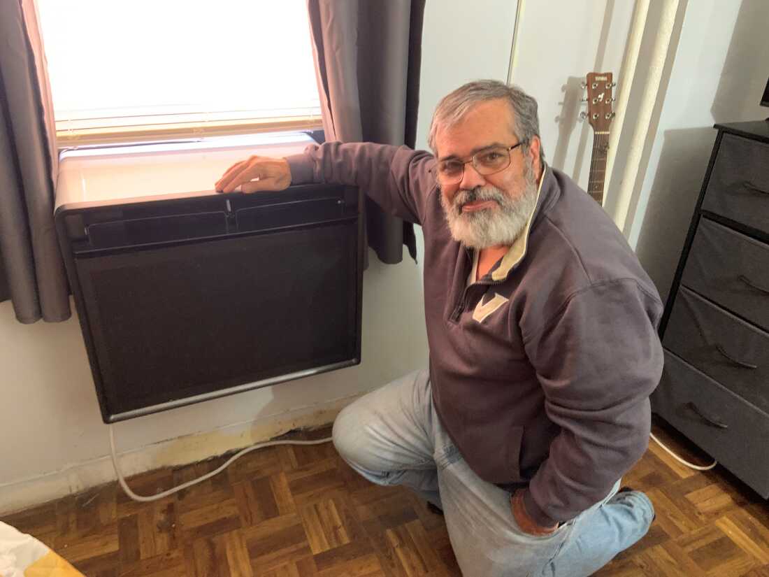 Joe Soto says the window heat pumps installed in his New York City Housing Authority apartment are more reliable than the old steam radiators.