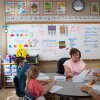 Math teacher Diane Laney hard at work in her third-grade classroom. Students use counters to help model multiplication.