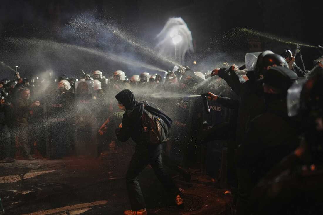 Riot police use pepper spray to clear protesters during a protest against the arrest of Istanbul's Mayor Ekrem Imamoglu, in Istanbul, Turkey, on Saturday.